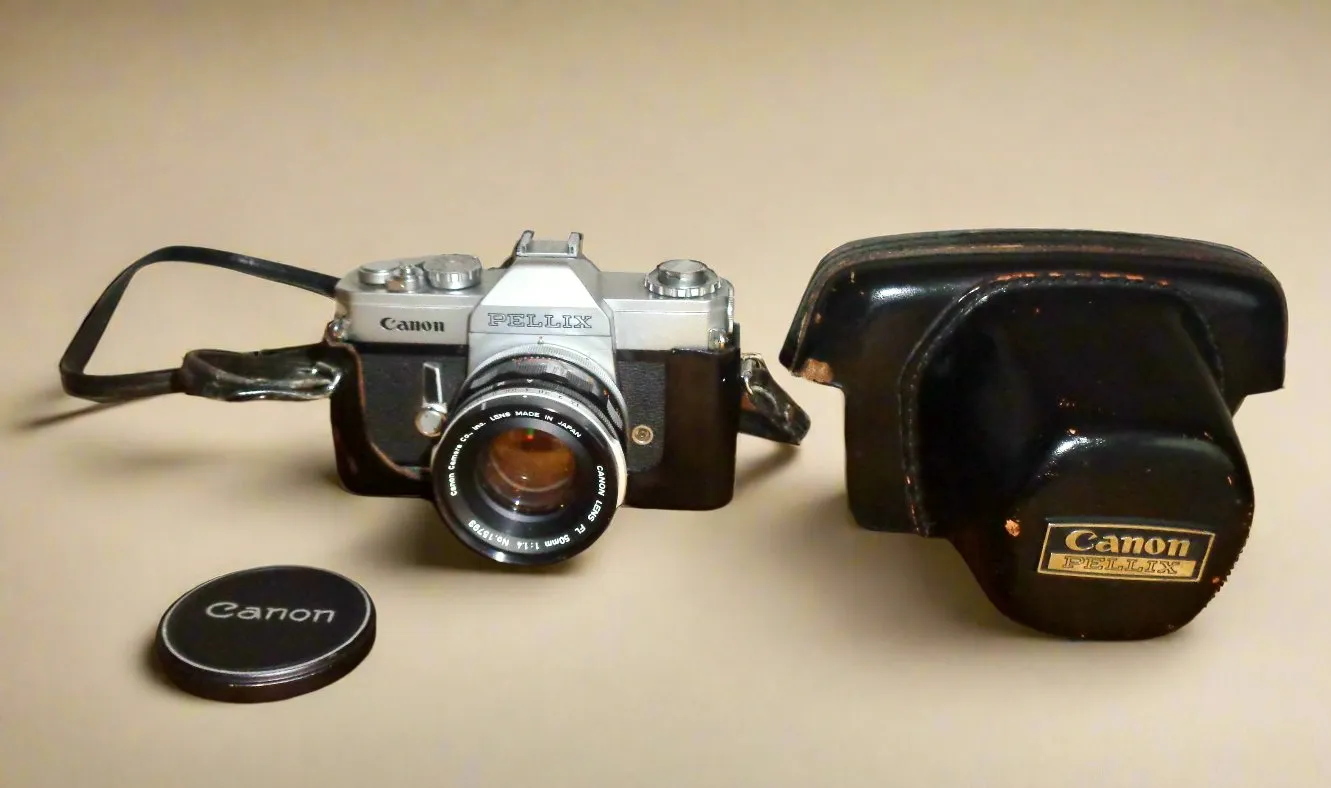 1960s Canon Pellix 35mm SLR Camera No.113691 With 50mm 1:1.4 Lens And Ever Ready Case